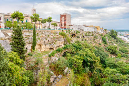 View at the rock settlements from the Neolithic in town Massafra - Italyの写真素材
