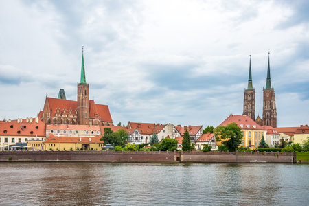 View at the Church of Holy Cross and Saint Bartholomew ,cathedral of Saint John the Baptist with Odra rover - Wroclawの写真素材