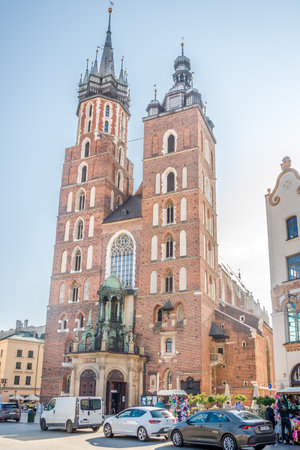 KRAKOW,POLAND - JULY 27,2023 - View at the Basilica of Saint Mary in the streets of Krakow. Krakow is the second largest and one of the oldest cities in Poland.のeditorial素材