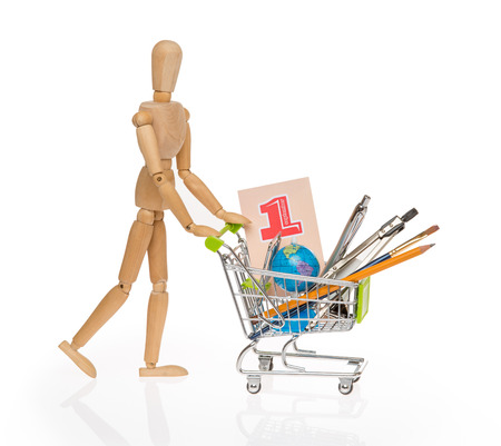high resolution photo of trolley with school equipment on white background and a card with the words "1 september"の写真素材