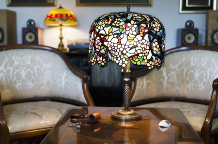 Beautiful hand made lamp on wooden tableの写真素材