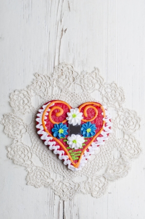 Handmade candied heart on wooden tableの写真素材