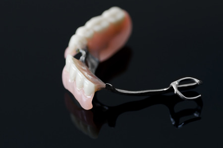 New dental prosthesis on black backgroundの写真素材