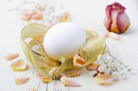 Easter eggs decoration on wooden tableの写真素材