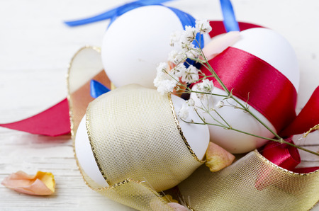 Easter eggs decoration on wooden tableの写真素材
