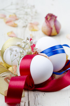 Easter eggs decoration on wooden tableの写真素材
