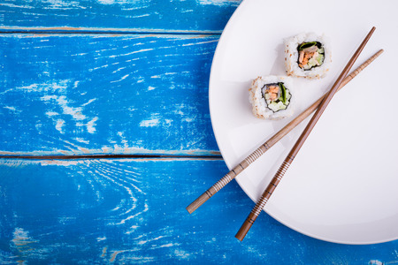 Fresh sushi on old wooden tableの写真素材