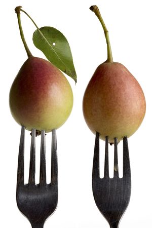 colorful pears stuck on forksの写真素材