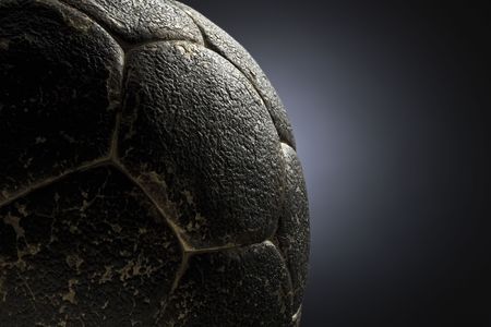 detail of an old leather soccer ballの写真素材