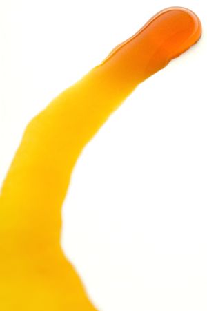 yellow ink drop on white