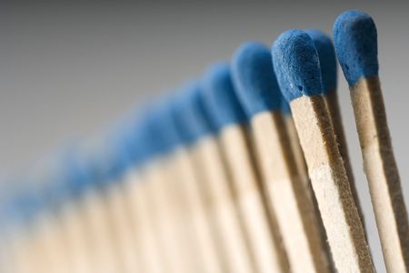 row of blue matchesの写真素材