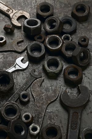 old wrenches and nuts on mechanic's floorの写真素材