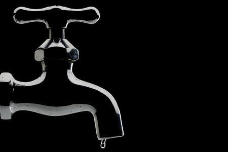 leaking tap - backlitの写真素材