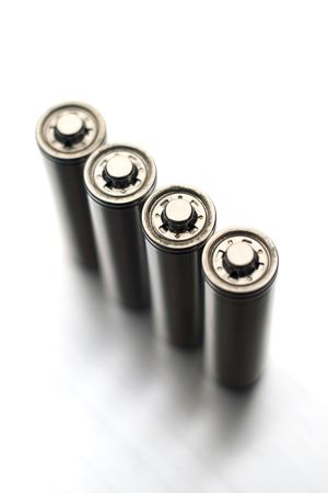 four AA batteries - top view (shallow depth of field)の写真素材