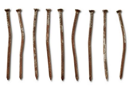 rusty nails on whiteの写真素材