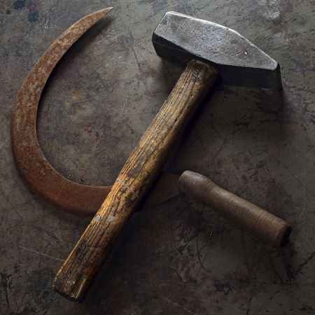 hammer and sickle on a grunge floorの写真素材