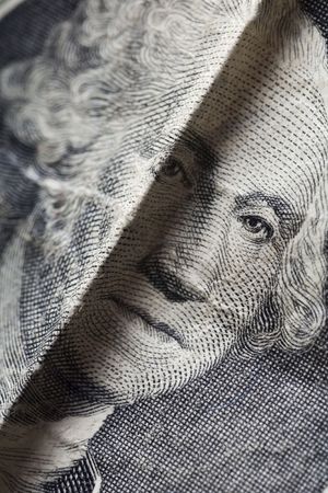 a closeup of a dollar bill - washington's portrait