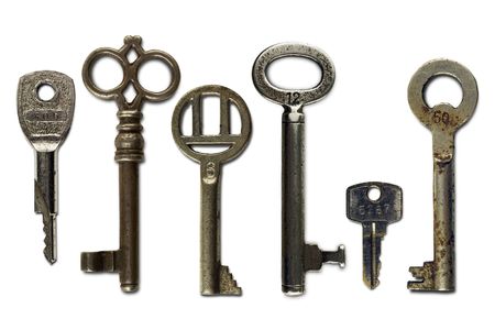 set of six vintage keys on whiteの写真素材