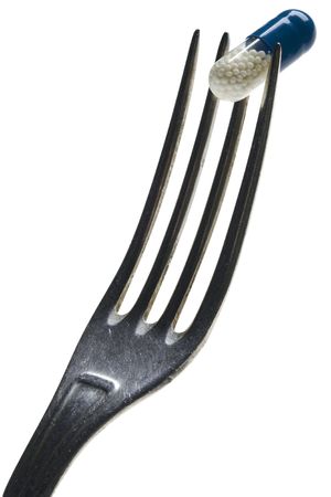 a pill meal - capsule on the fork
