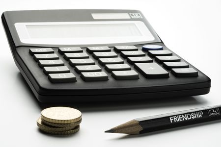 calculator, pencil and small change on whiteの写真素材