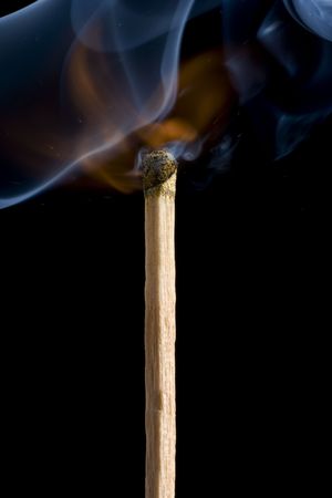 closeup of a match in a moment of ignition