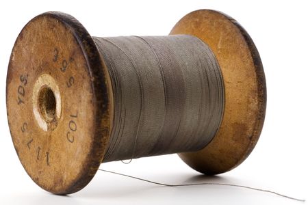 spool of thread on white