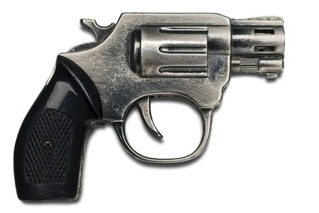 a metal toy gun on white with clipping path