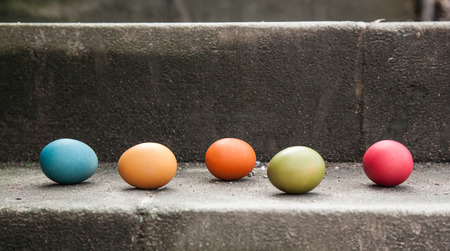 Five easter eggs on the stairの写真素材