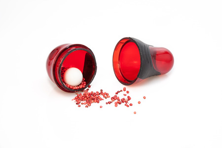 Spice grinder with red pepper and white bowlの写真素材