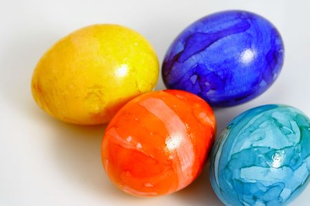 colored eggs on the white backgroundの写真素材