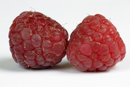raspberries on the white background
