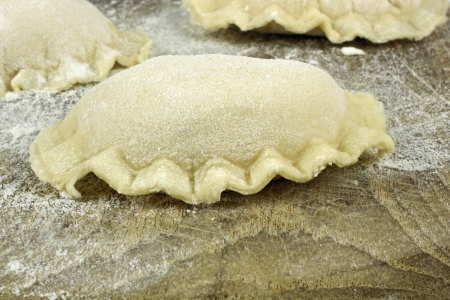 raw homemade polnische pierogi  dumplings of unleavened doughの写真素材