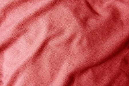 Close up of creased material background or texture