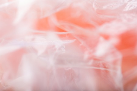 Abstract of plastic foil useful as background. Close up of creased plastic foil bag.の写真素材