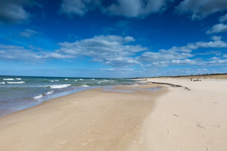 Beautiful view on Baltic sandy coast photographed on middle of the dayの写真素材