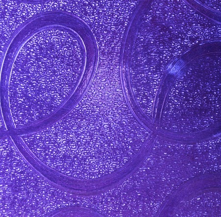 Abstraction of close up glass with patterns in doors. Texture useful as background.