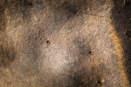 Old destroyed beaverboard texture useful as background. Grungy backgroundの写真素材