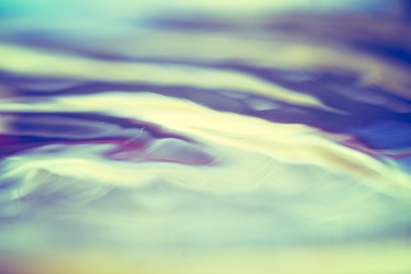Abstract background of moving water surface close upの写真素材