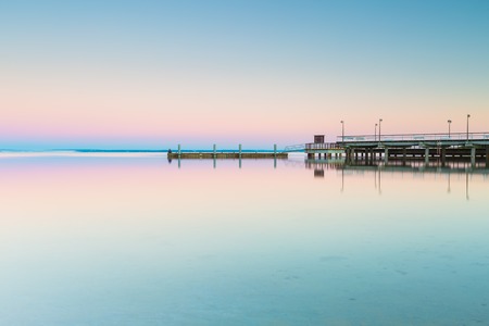 Beautiful wooden pier on Baltic sea shore. Wooden molo in Jastarnia on Hel peninsula.