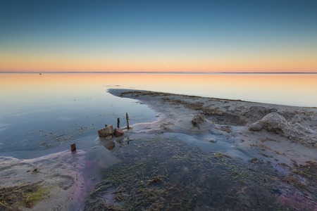 Beautiful seascape of Bay before sunrise. Calm place in Jastarnia in Poland, Gdanska bay.