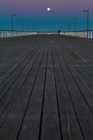 Beautiful wooden pier on Baltic sea shore. Wooden molo in Jastarnia on Hel peninsula.の写真素材