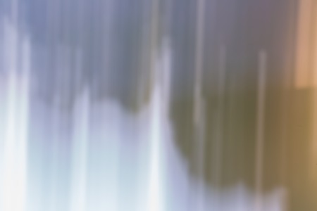 Beautiful colorful bokeh background. Natural defocused background of summer forest or water.の写真素材