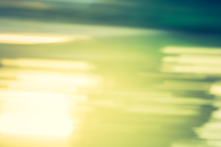 Abstract photo of defocused summer forest, photo useful as background. Vintage mood effect