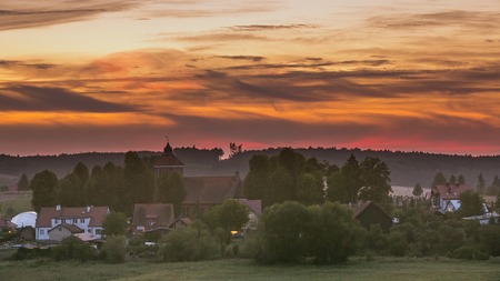 Beautiful and spectacular sunset sky over calm countrysideの写真素材