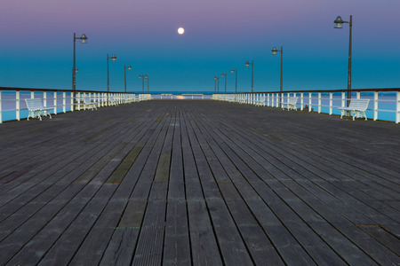 Beautiful wooden pier on Baltic sea shore. Wooden molo in Jastarnia on Hel peninsula.の写真素材