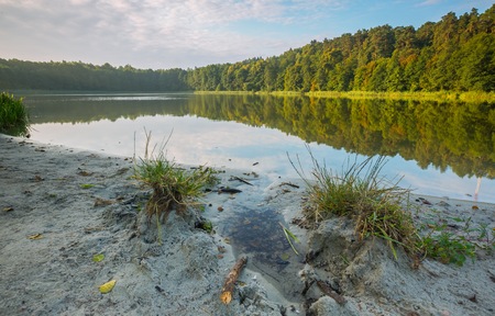 Beautiful lake landscape with nice light. Natural landscape of lake in Polandの写真素材