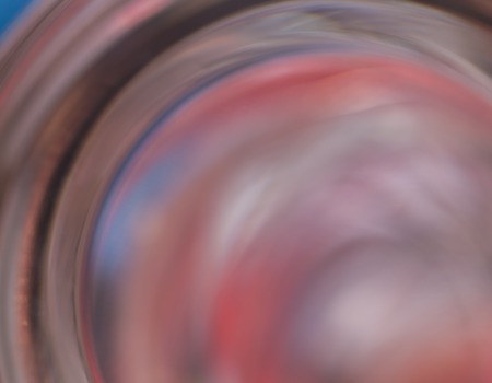 Thick glass abstraction made with glass vase and glass on shallow depth of field.