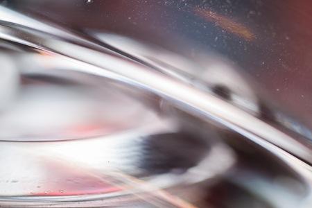 Thick glass abstraction made with glass vase and glass on shallow depth of field.の写真素材