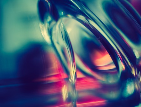 Vintage photo of thick glass abstraction made with glass vase and glass on shallow depth of field.の写真素材
