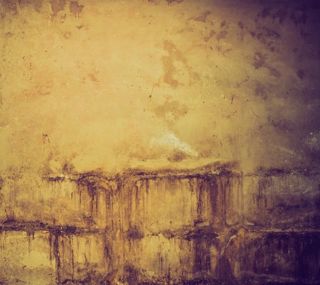 Vintage photo of old destroyed concrete wall backgroundの写真素材